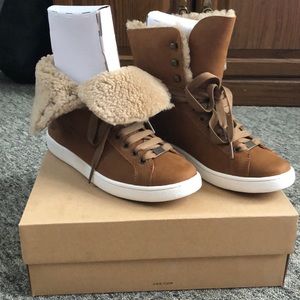 Ugg high top sneakers.